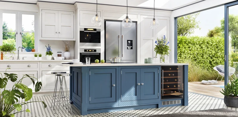 Bright country kitchen remodel with dusty blue island and white cabinets. Bright country kitchen remodel with dusty blue island and white cabinets.